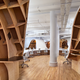 Illustration for article titled This gorgeous office has an endless desk made by robots